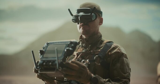 Special Forces Drone Pilot Wears FPV headset and Operates a Ground Station in Desert Terrain, AI UAV Reconnaissance, Surveillance, Target Strike, Battlefield. High-tech War Military Operation.