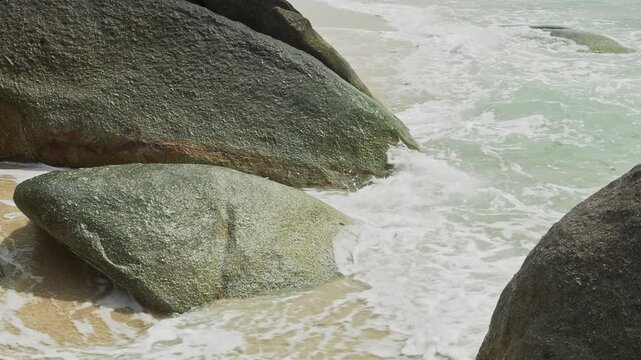Sea waves over big rocks
