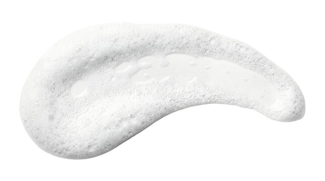 Close-up of white cream or foam on white background