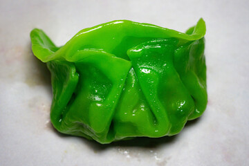 Green jade dumpling gyoza spinach dough, Jade colored dumpling creative fusion dim sum, Steamed green dumpling vibrant © น้าหนอน