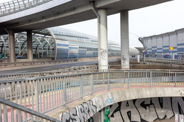 Fototapeta premium WARSAW, MASOVIAN, POLAND - FEBRUARY 27 2026: Modern urban highway infrastructure with noise barriers.