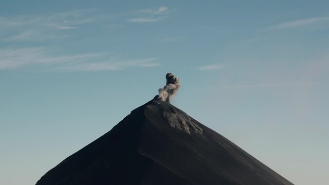 Smoke plume drifting from active Fuego volcano crater