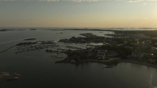 Panoramic Wide Angle Drone Shot of Hanko Marina and Coastal Architecture at Dusk