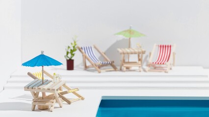 Fototapeta premium A serene beach setup with chairs and umbrellas ready for relaxation