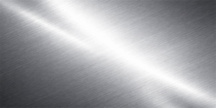 A polished stainless steel plate creates an industrial brushed metal background with a smooth silver texture and shiny light gray reflections on a metallic aluminium surface pattern