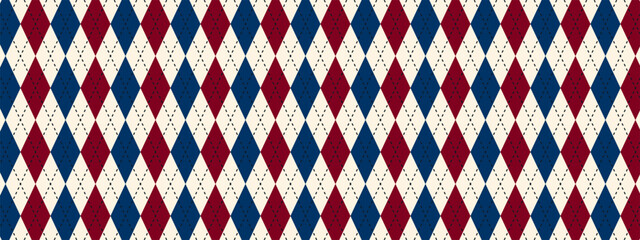 Obraz premium Traditional argyle pattern with blue and red rhombus shapes. Fabric diamond print for sweater, plaid or wrapping paper. Simple geometric background. Father Day wallpaper. Vector illustration.