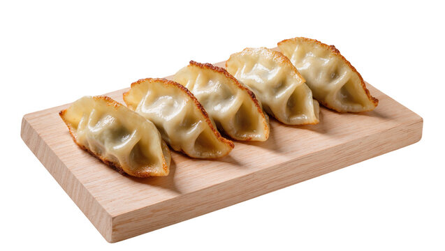 Isolated traditional crispy fried gyoza dumplings on a wooden board, delicious Asian cuisine