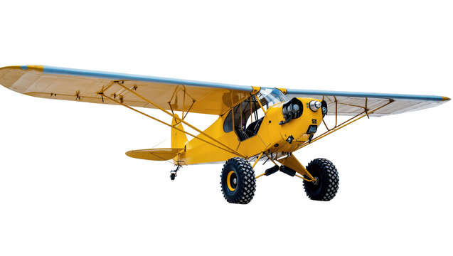 Isolated yellow propeller plane with large bush tires for rough terrain adventure flying