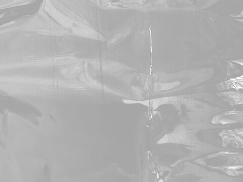plastic wrap film wrinkled texture transparent reflective highlights isolated realistic packaging material shipping storage protection