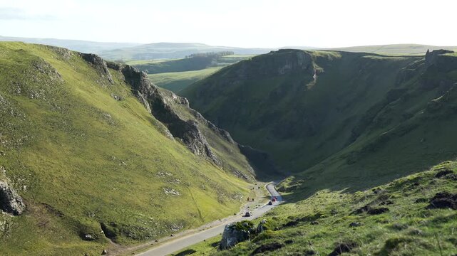 Scenic landscape view of narrow road at Winnats Pass in Peak District, UK