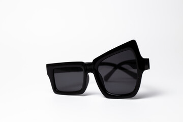 Bold Black Angular Square Sunglasses Close-Up on white background