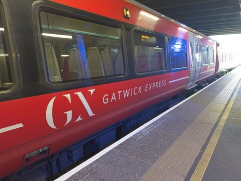 A Gatwick Express red rain in the UK Gatwick Airport Terminal rail station. Platform.