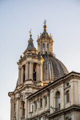 Obraz premium Baroque church dome and bell tower in Rome