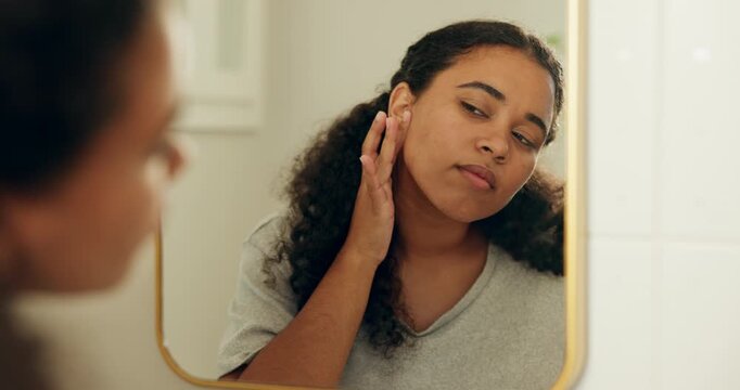 Mirror, skincare and woman in bathroom, morning routine and inspect for acne, wellness and dermatology. Reflection, facial or person in home, healthy skin and cosmetics for shine, glow or check flaws