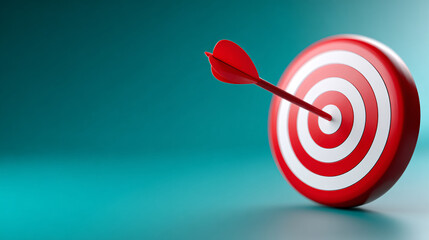Red dart hitting the center of target with large copy space representing success, goal achievement, business strategy and focus concept.