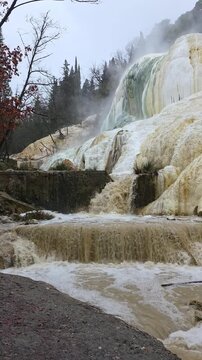Natural thermal springs of Bagni San Filippo and Balena Bianca limestone formation in Tuscany, Italy