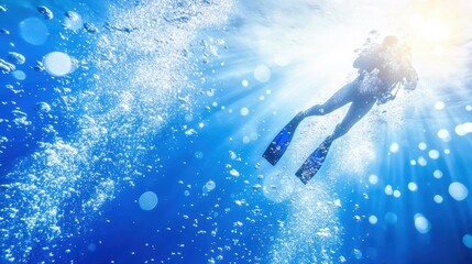 Fototapeta premium scuba diver swimming underwater in blue ocean with sunlight rays and bubbles representing marine exploration adventure travel and underwater sport