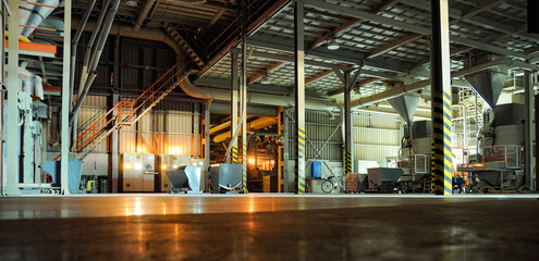 Fototapeta premium Modern Industrial Factory Interior with Machinery and Structures