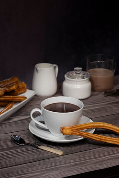 Morning breakfast with churros and hot chocolate drink