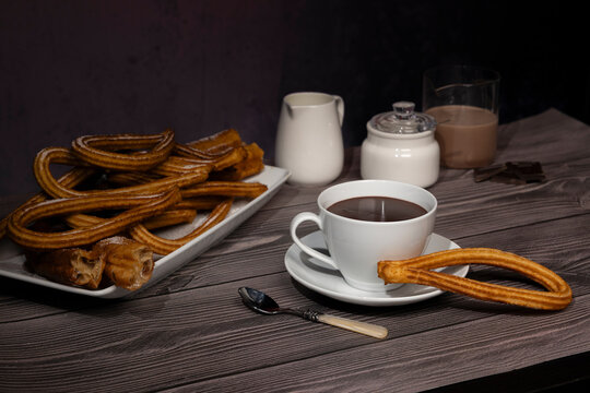 Spanish sweet snack churros with chocolate cup