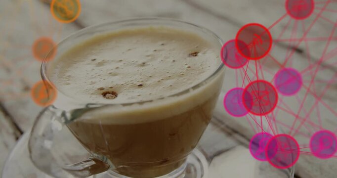 Glass coffee cup resting on rustic wooden table, showing frothy crema and network overlay graphics
