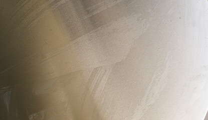 Textured background showing a close-up of a brushed metal surface with subtle imperfections, ideal...