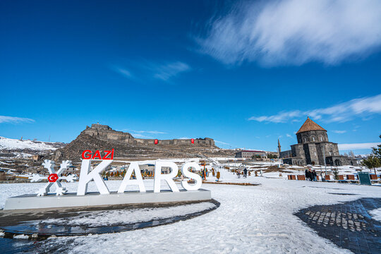The scenic views of "Kars" sign for taking photo for memories in front the landmark Kars Castle in Kars, Turkey
