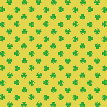 Seamless background pattern featuring repeating vibrant green shamrocks scattered evenly across a bright festive yellow backdrop celebrating Irish heritage