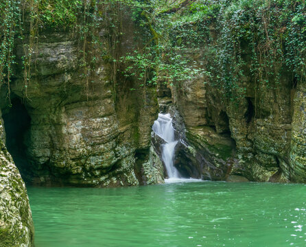 waterfall in deep forest at nature park