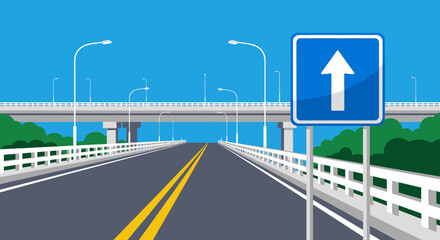 Modern Highway Overpass with Upward Arrow Traffic Sign and Streetlights Under Blue Sky © IMRONI