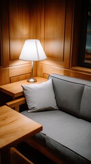 Fototapeta premium Soft light from candles illuminates a cozy space with blankets, inviting relaxation during a calm night