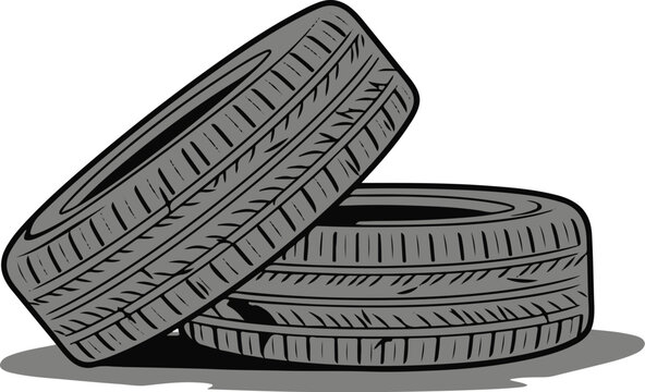 Two gray vehicle tires stacked, one leaning on the other, displaying distinct tread patterns