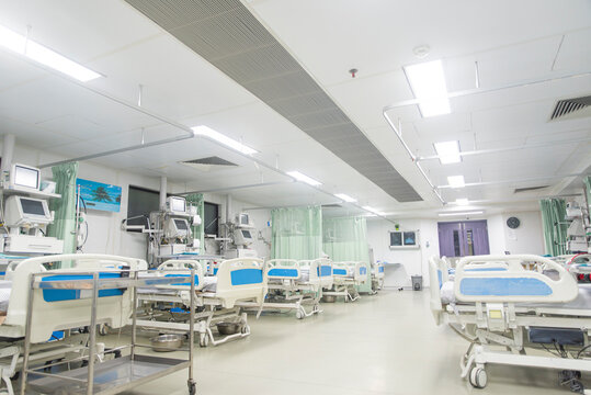 Modern hospital ward with empty beds medical equipment healthcare facility clean bright interior