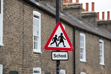 pedestrian crossing near school sign © Patrick
