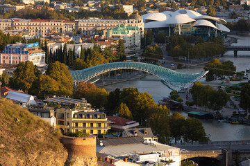 Tbilisi Cityscape With Peace Bridge And Public Service Hall At Sunset © Vadim Volodin