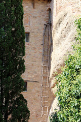 Fototapeta premium Meteora Rousanou Monastery Rope Ladder August 2024 Ancient wooden ladder on stone wall
