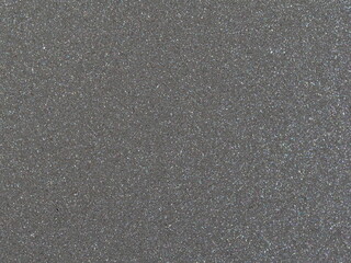 Macro shot of fine silver metallic car paint texture