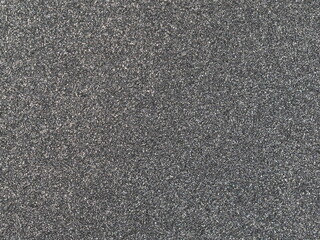 Macro shot of medium grey metallic car paint texture © Remek