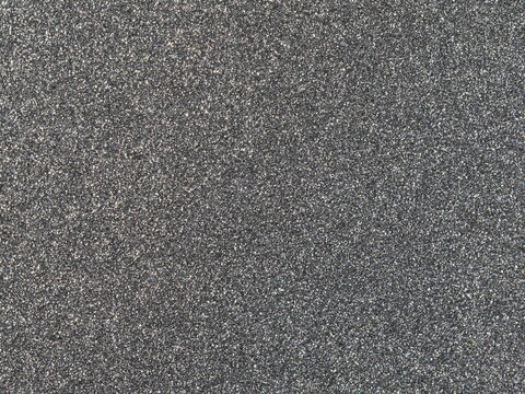Macro shot of medium grey metallic car paint texture