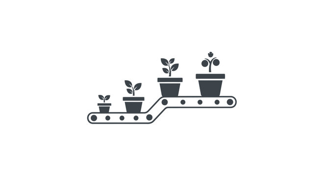 Small Potted Plants on Conveyor Belt.