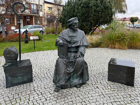 Lask, Poland October 14, 2025: Monument to Jan Laski in the square in front of the Collegiate Church of the Immaculate Conception of the Blessed Virgin Mary and St. Michael the Archangel