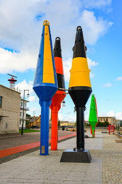 Navigation buoys exhibition on the waterfront promenade of Ostas Street in the port of Ventspils, Latvia