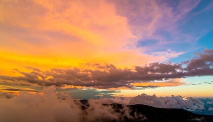 Fototapeta premium Vibrant Sunset over Mountains Landscape Scene.