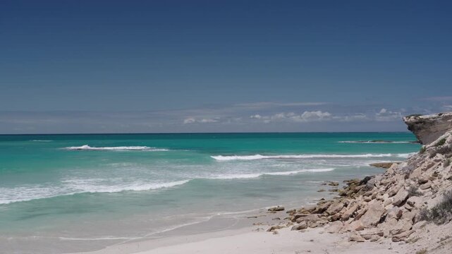 4k 60p footage of stunning golden sands meeting turquoise waters along Arniston&rsquo;s beautiful Overberg coastline, Western Cape, South Africa. Iconic, remote beach serenity.