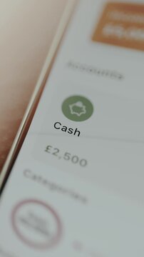 Financial management app displaying a balance of 2500 pound sterling of cash