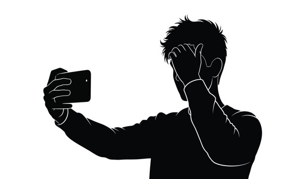 A silhouette of a young man holding a smartphone up to take a selfie while touching his forehead
