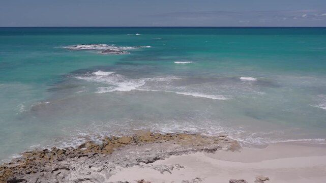 4k 60p footage of stunning golden sands meeting turquoise waters along Arniston&rsquo;s beautiful Overberg coastline, Western Cape, South Africa. Iconic, remote beach serenity.