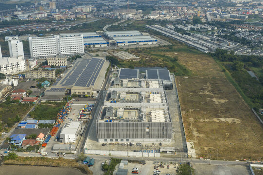 aerial view of discovering a large ai data center complex in bang sao thong, samut prakan, thailand, integrating renewable energy infrastructure