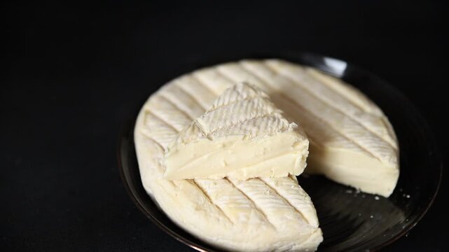 Soft cheese Camembert, Brie or Coulommiers cheese head tasty snack fresh gourmet food background on the table rustic food top view copy space marketing concept photo