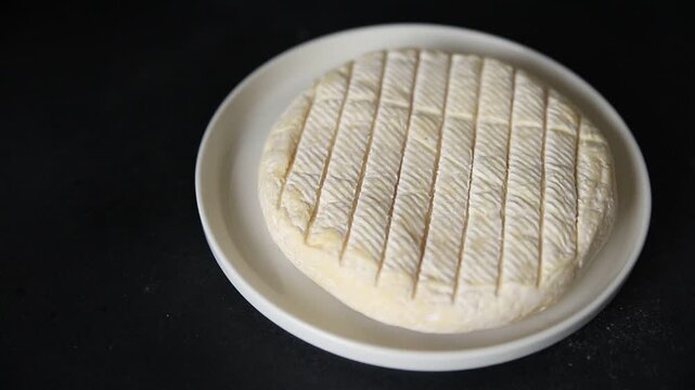 Soft cheese Camembert, Brie or Coulommiers cheese head tasty snack fresh gourmet food background on the table rustic food top view copy space marketing concept photo